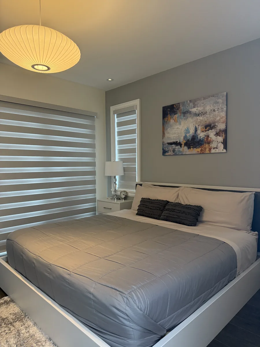 Clean organized bedroom with queen bed and natural light - GTA home cleaning